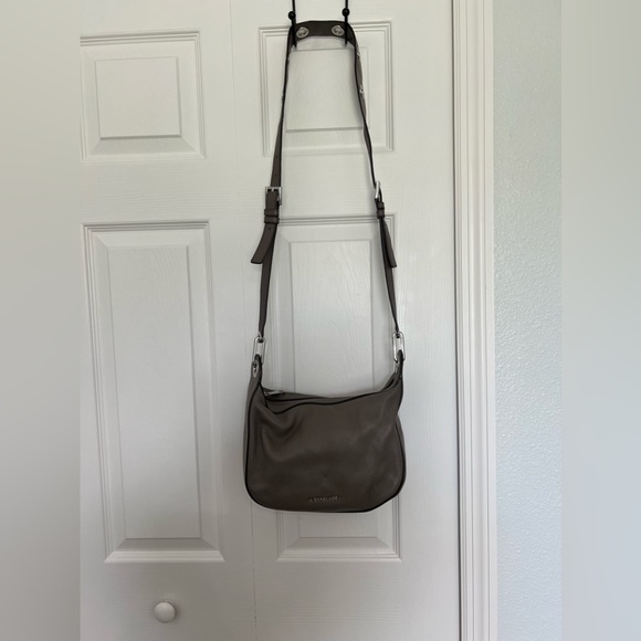 Michael Kors Handbags - Michael Kors Gray/Silver Crossbody! Has some wear in it but clean!